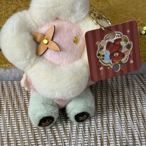 Cute Plush Keychain with Flower Accent
